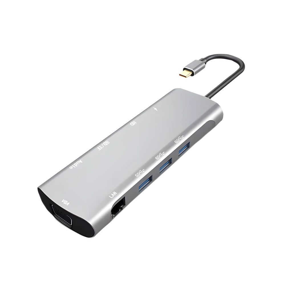 Grey aluminium USBC docking station with HDMI, VGA, USB ports and a short attached cable on a wooden desk