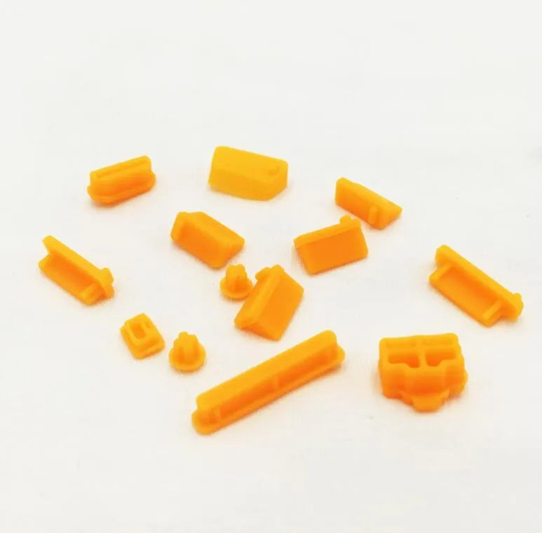 13-piece silicone laptop dust plug set for VGA USB HDMI audio RJ45 SD and 1394 ports in transparent and colours