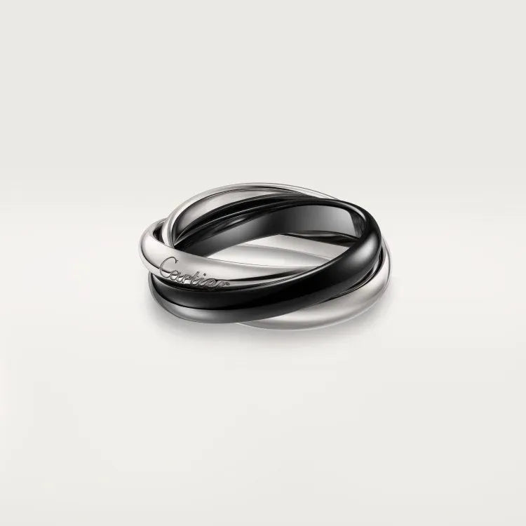 Sterling silver couple's ring with full diamond setting and geometric design on a size 8 finger.