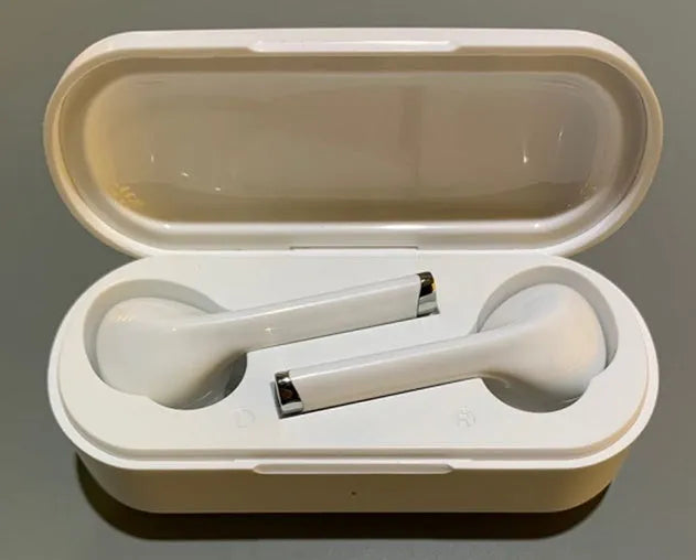 Black and white wireless Bluetooth 5.0 earbuds with USB charging dock showing true wireless design