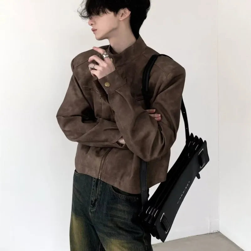 Men's retro brown PU leather short coat with long sleeves and tight fit, shown in casual style.