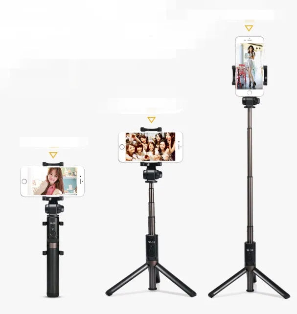 Black Bluetooth selfie stick with extended tripod legs holding a smartphone