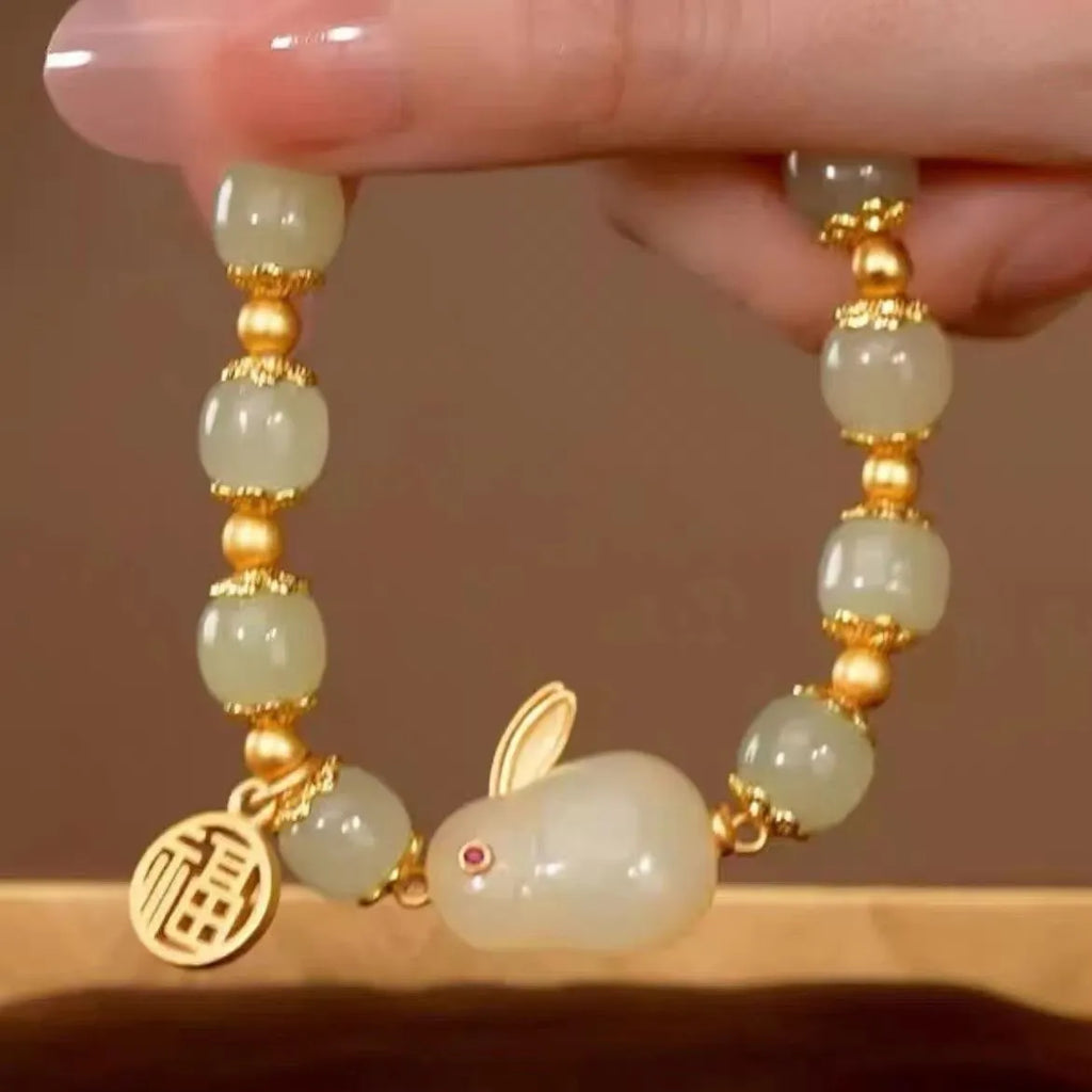 Green Lucky Jade adjustable bracelet with fu character and hare charm on black hand style band