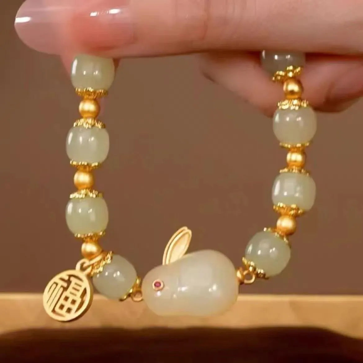 Green Lucky Jade adjustable bracelet with fu character and hare charm on black hand style band