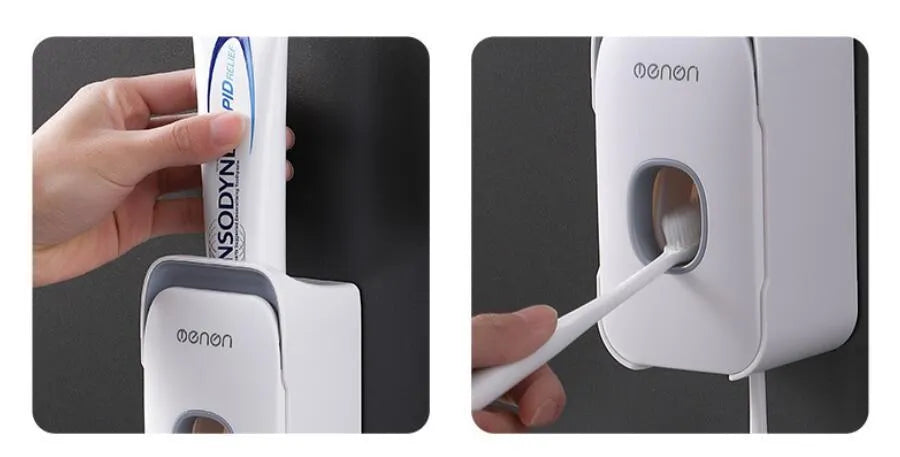 Automatic toothpaste dispenser in grey, blue, and pink colours on a bathroom countertop.