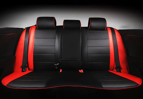 Cow leather car seat cover in beige and black with red line styles, showing binding detail