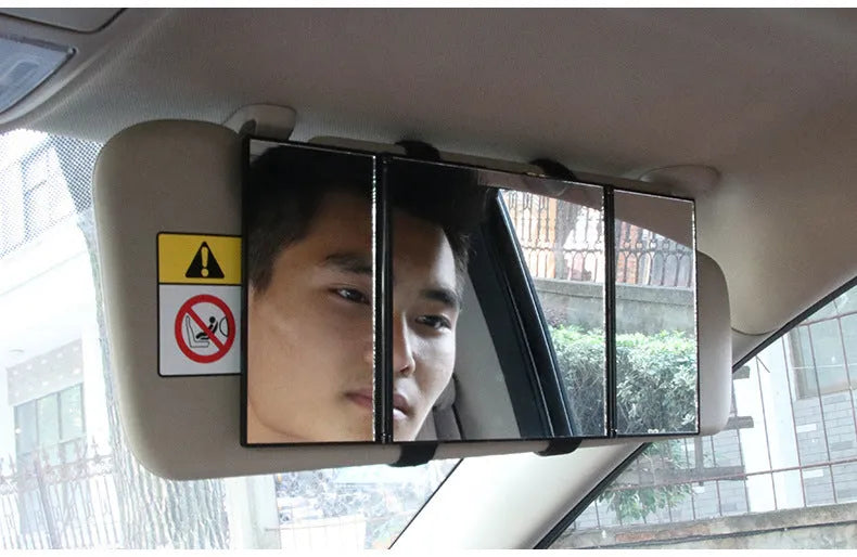 Silver folding car makeup mirror shown both closed and open on a car visor.