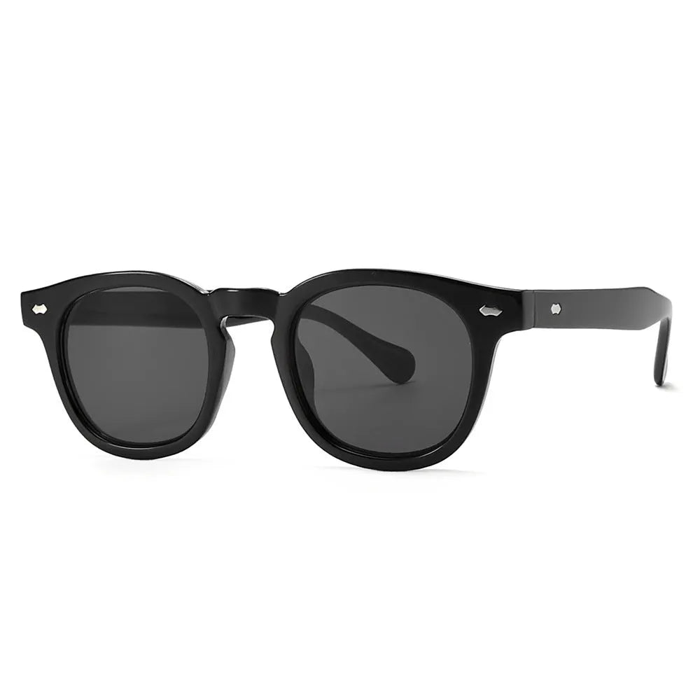 Simple round rim retro sunglasses on a plain background showing bright black frame with blue lenses.