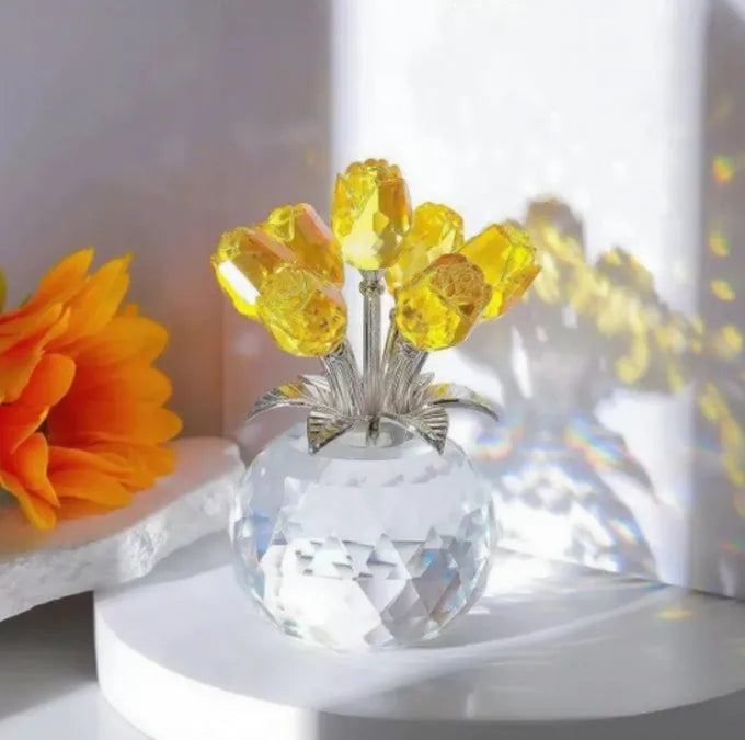 Handcrafted geometric rose ornament made from coloured K9 crystal glass on a neutral background.