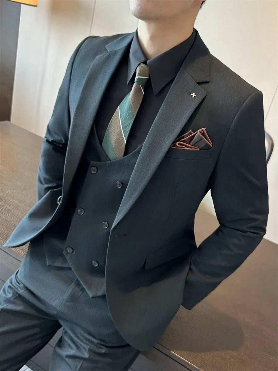 Men's slim fit business formal wear jacket in a dark green colour, showing structured blazer design.