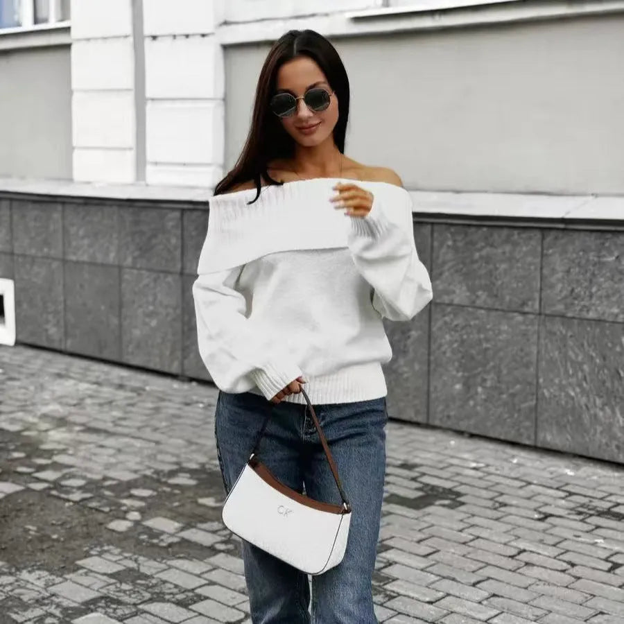 Grey off-the-shoulder sweater with a 3D textured pattern, shown on a model.