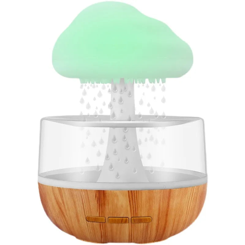 White USB-powered humidifier and essential oil diffuser with colour-changing night light on a table.