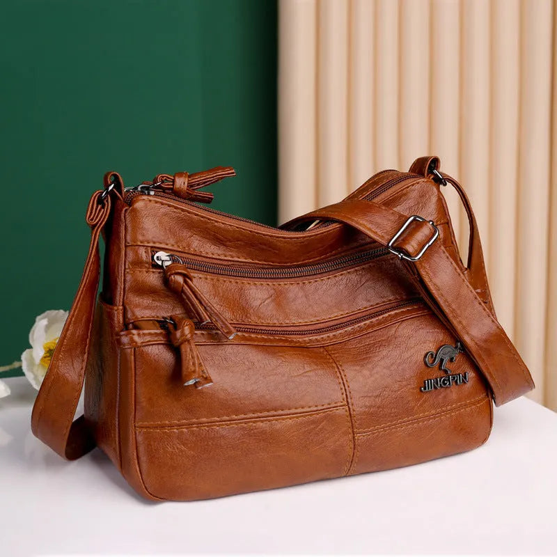 Crossbody shoulder bag in soft textured PU, black, 25x17x9cm, with sandwich pocket