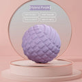 A 6cm diameter pink TPR foot massage ball on a plain background.