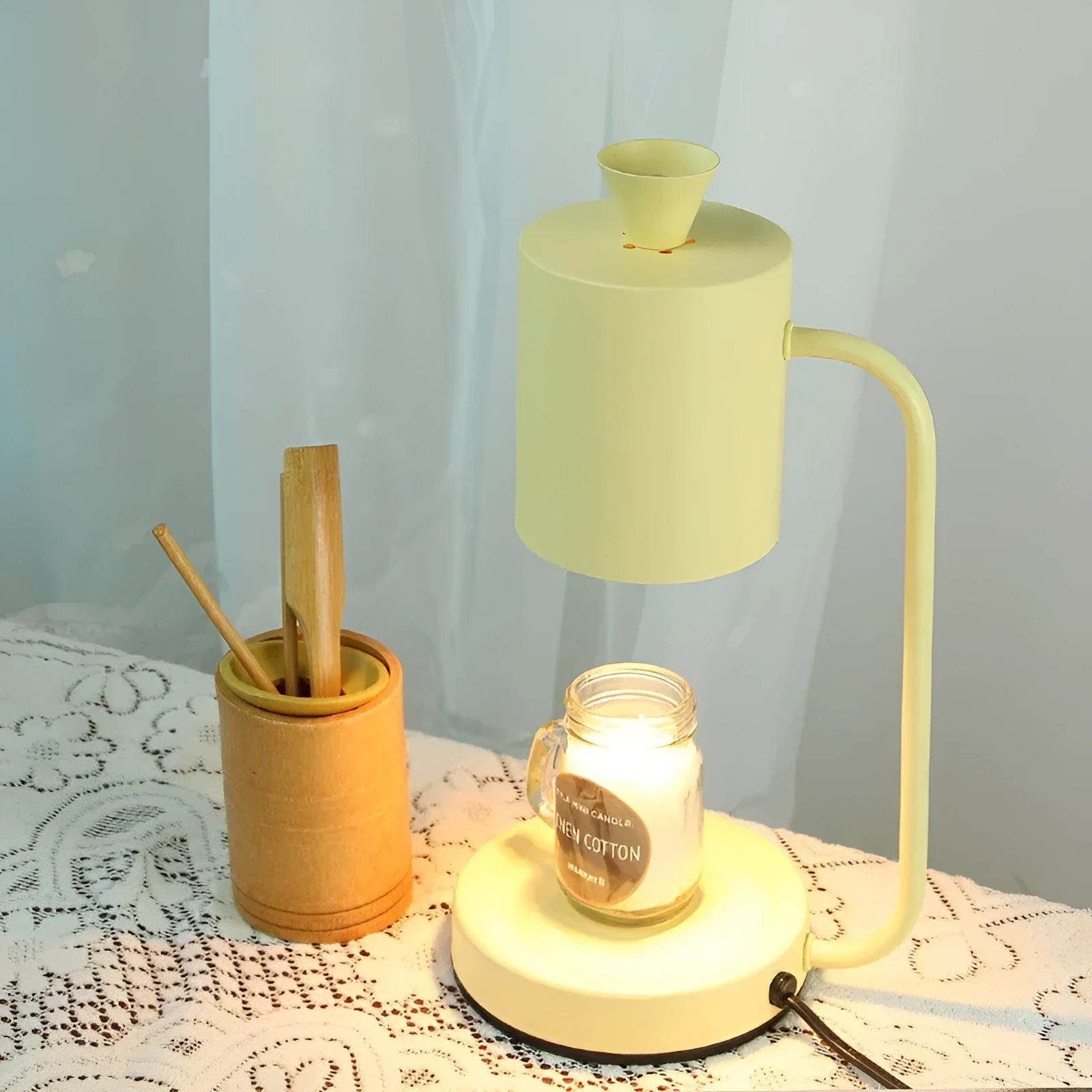 White European-style aromatherapy wax lamp with a dimmer switch on a steel holder.