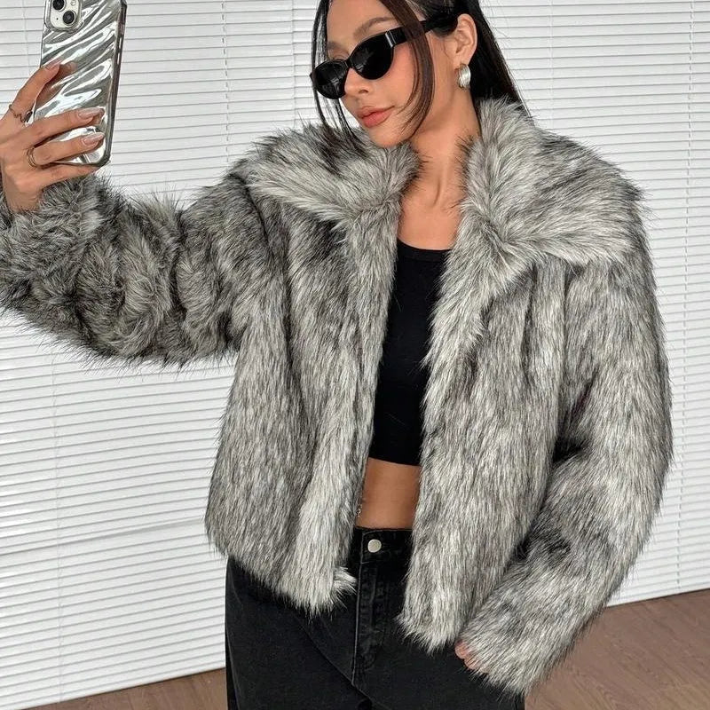 A woman's short-length artificial fur coat with a faux fur collar in a plush grey Maojian tea colour.