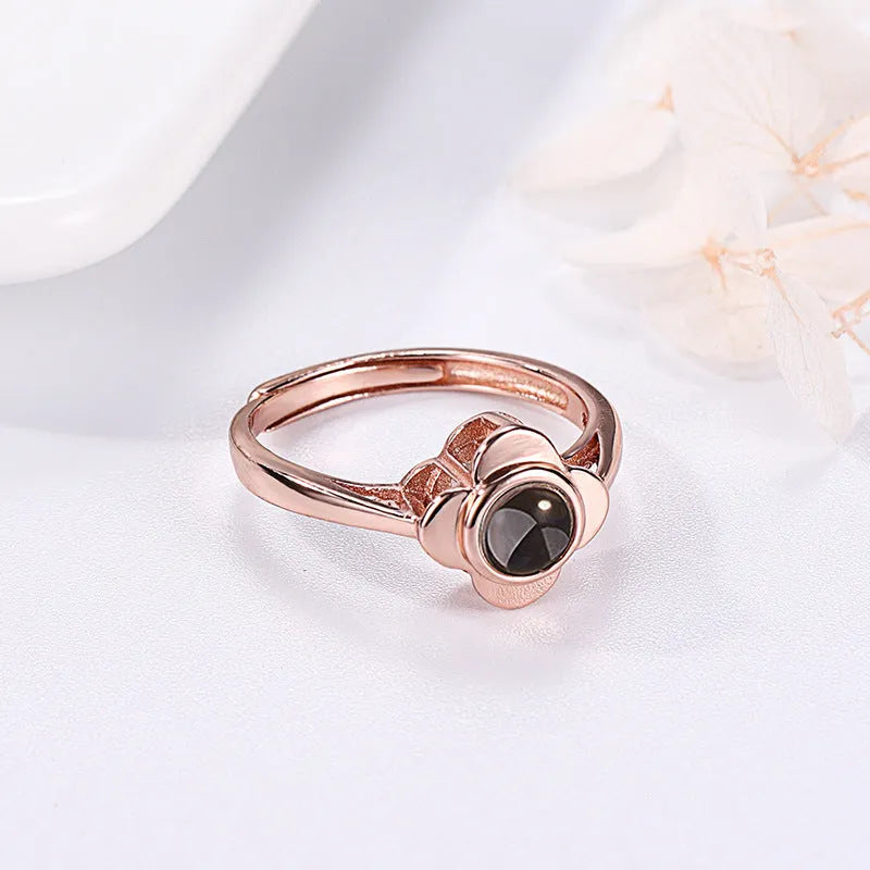 925 sterling silver adjustable projection ring with flower shape design and love stone projection feature