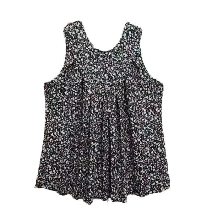 Plus size black sleeveless vest with floral print, showing loose fit and round neckline on a model.