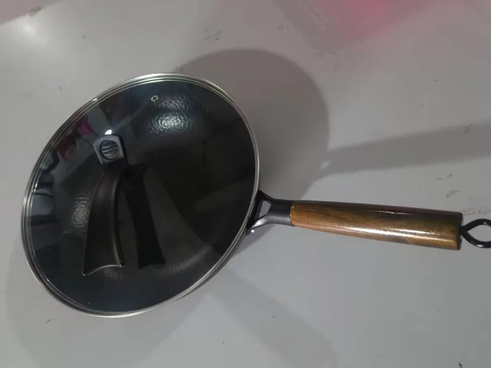 Traditional black iron wok with wooden handle, 32cm diameter