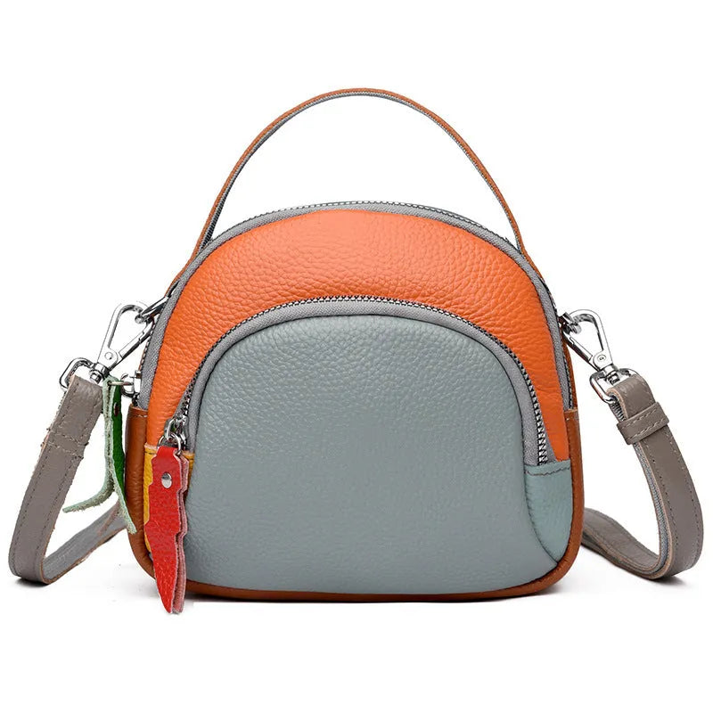 Hand-held crossbody first layer cowhide leather single-shoulder bag in soft round shape with sewing line detail