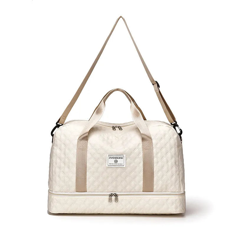 Large capacity Oxford cloth travel bag in a solid colour with visible sewing thread detail.