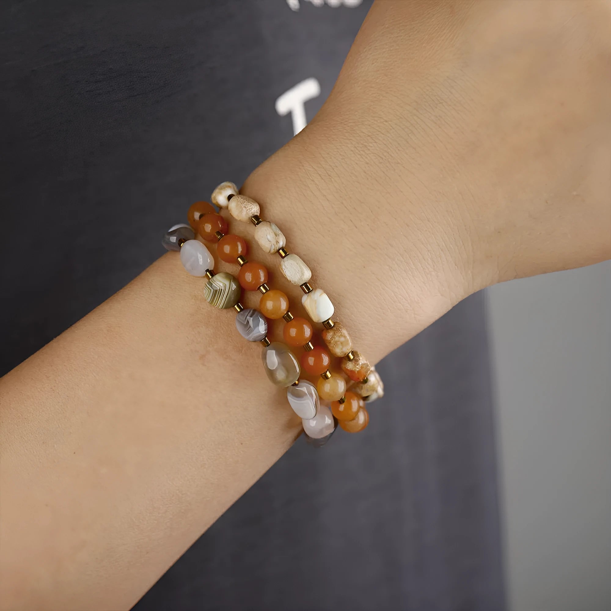 Hand-woven multi-layer bracelet with Persian Gulf agate beads in geometric design showing texture patterns