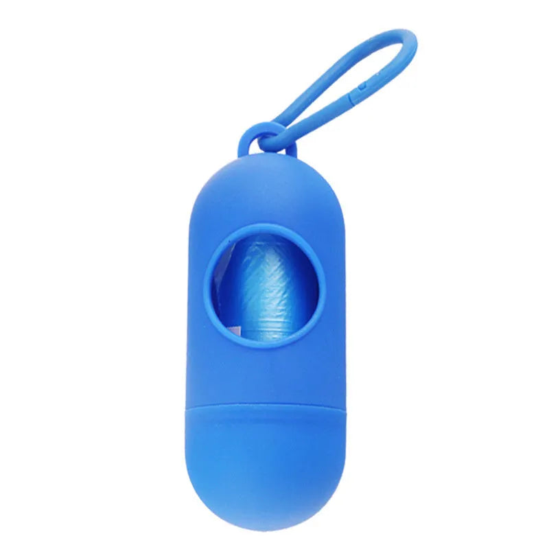 Small, lightweight dog poop bag holder showing side hook and Velcro strap for attachment.