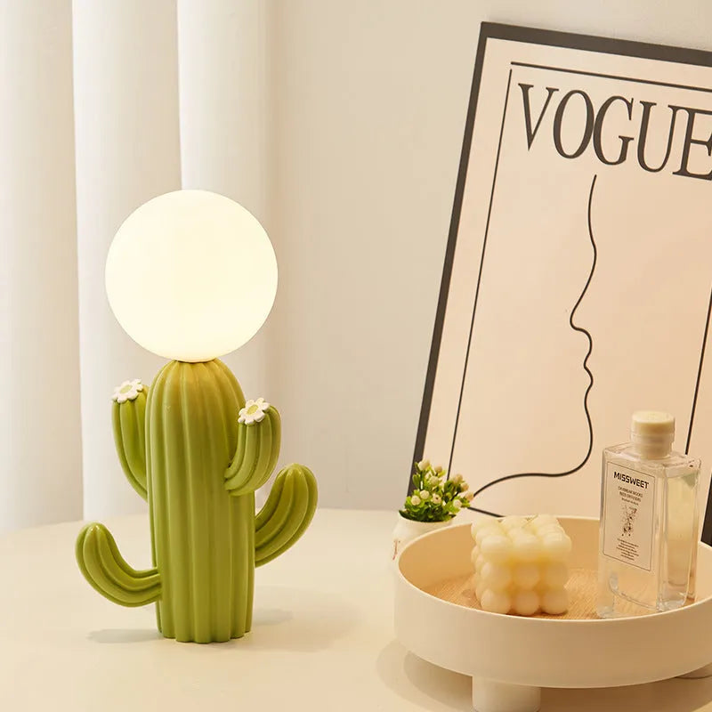 Green cactus button 3W plug-in bedside lamp on a modern nightstand