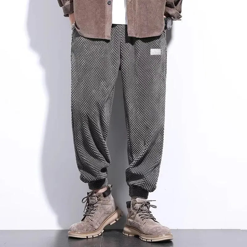 Men's grey ankle-tied casual sweatpants with straight leg cut and adjustable fastening