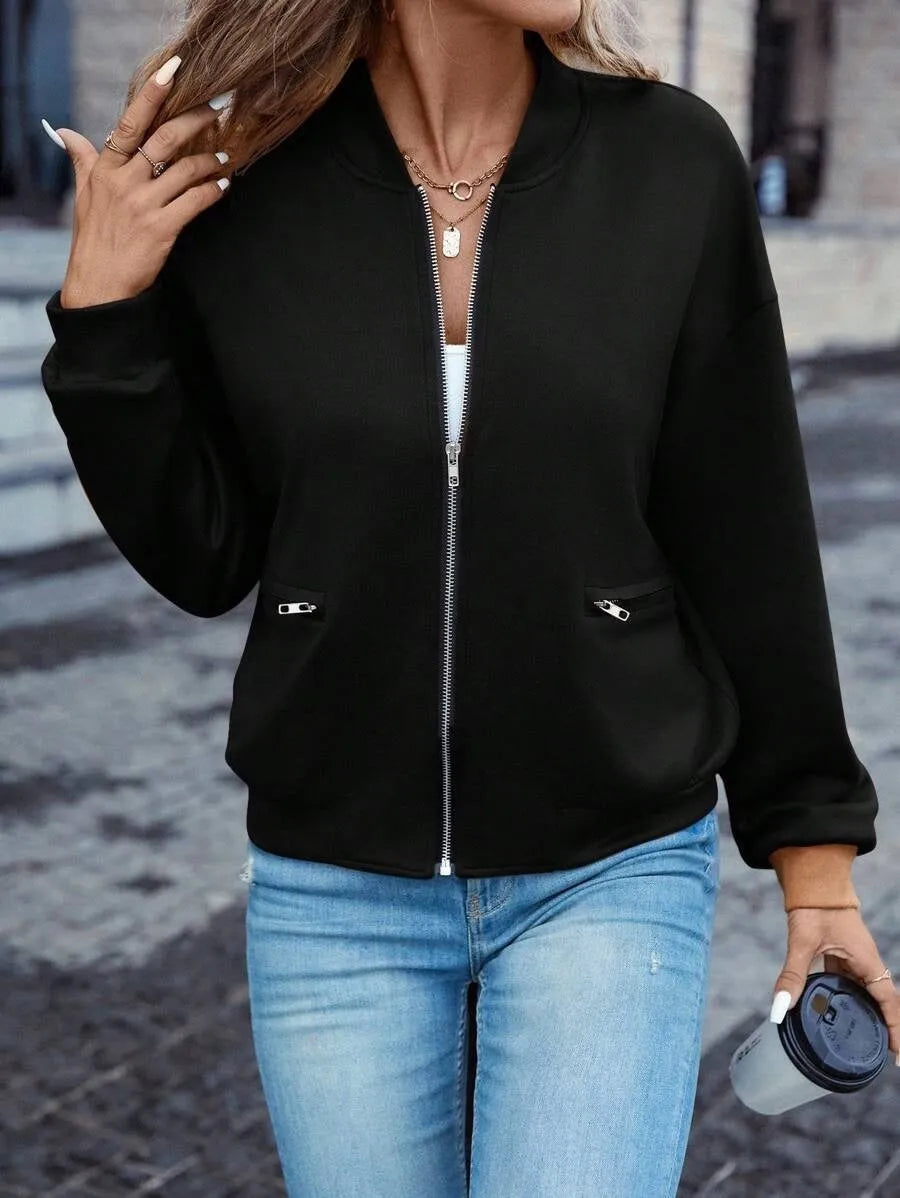 Women's black casual zip jacket with long sleeves and faux pockets