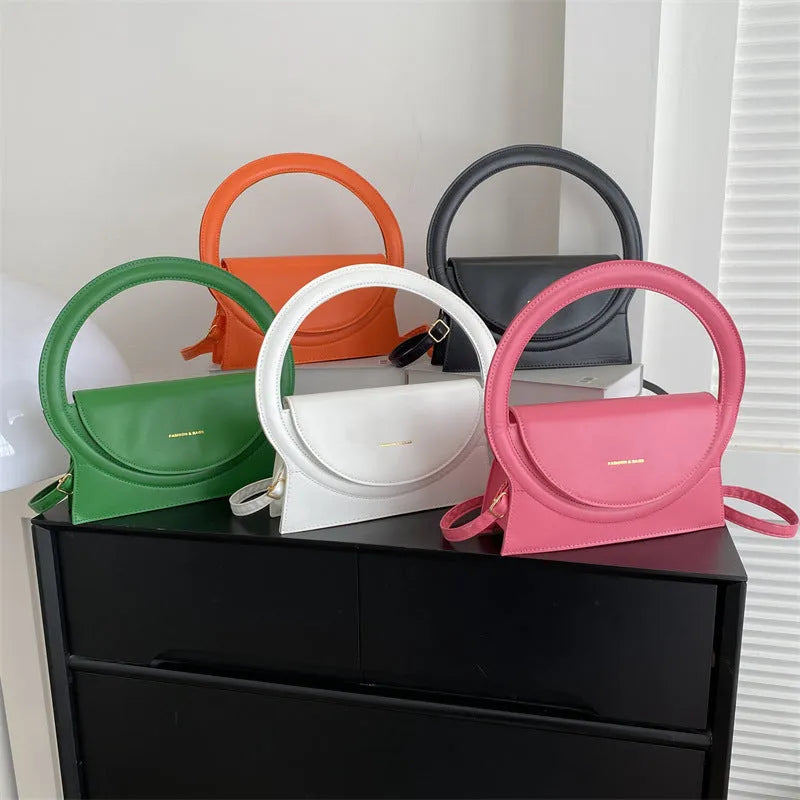 PU leather horizontal messenger bag with sandwich pocket and stitching details