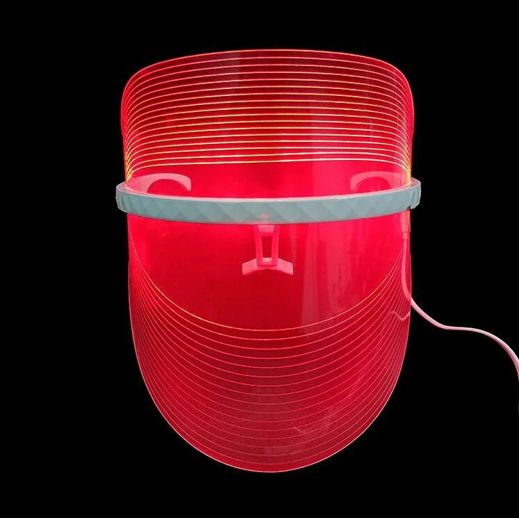 Transparent ABS LED light therapy face mask with red, yellow, and blue lights for home skin care