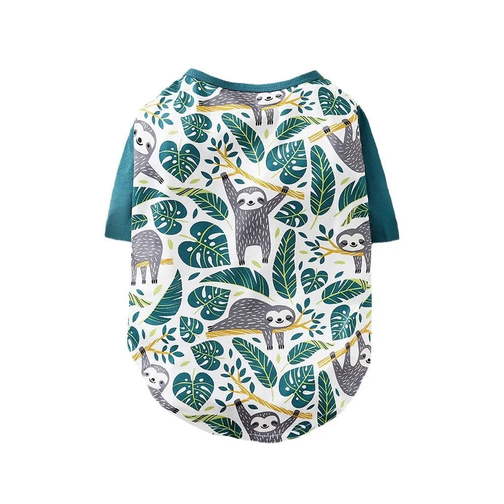 Colourful printed T-shirt on a small dog, showing the casual fit and full graphic design.