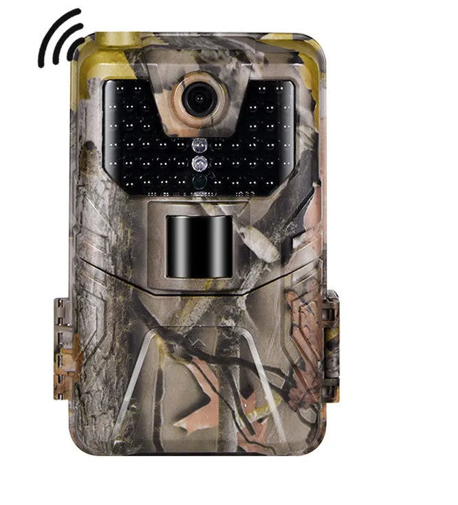 Compact camouflage trail camera with infrared LEDs, showing front display and lens.
