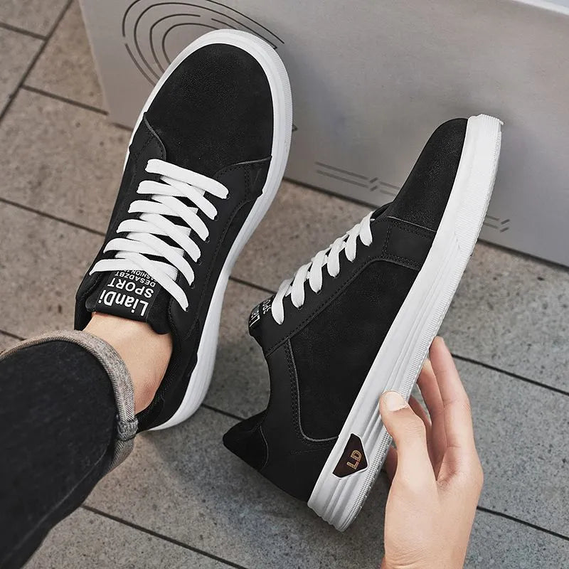 Men's black snake pattern PU leather casual sneakers with round toe and flat rubber sole on a white background
