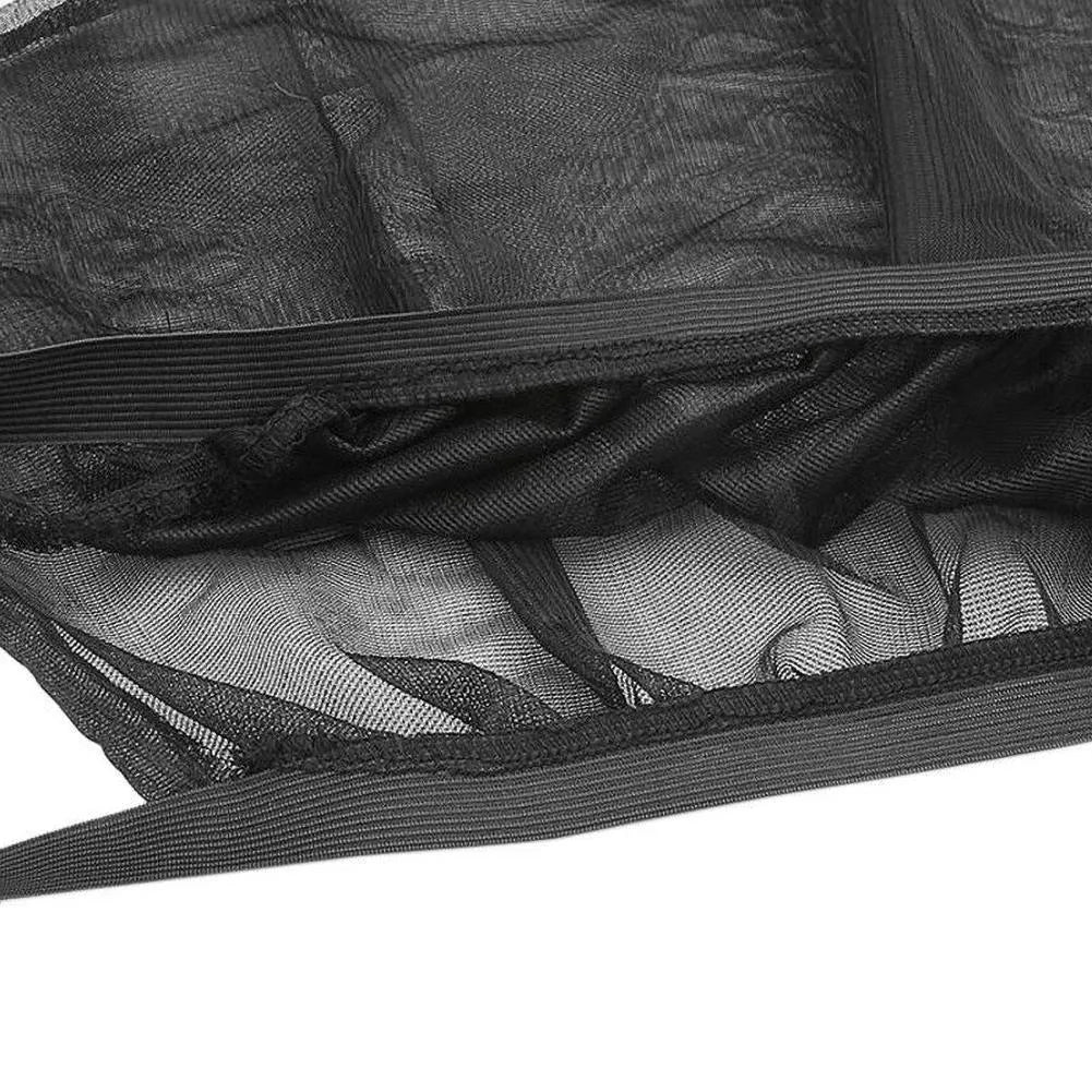 Set of four grey mesh car side window sunshades with elastic edges, shown fitted on a car.