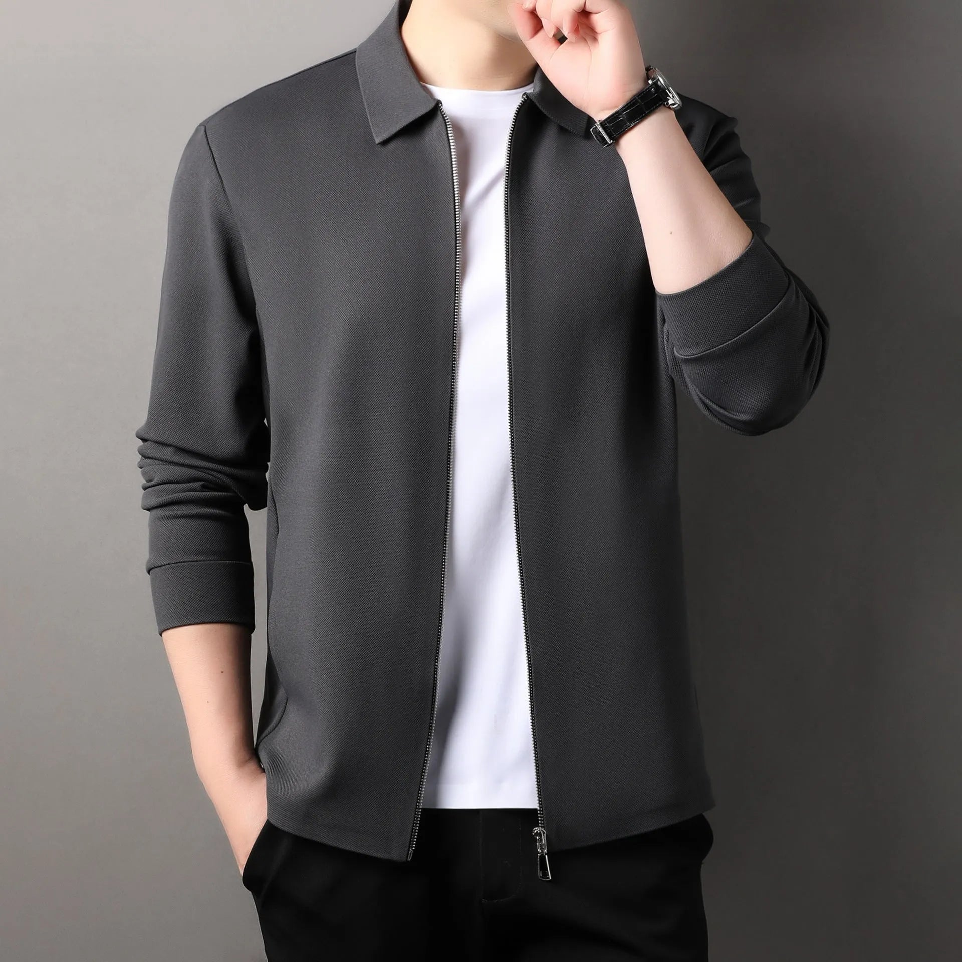 Men's polyester casual business jacket in apricot colour with straight hem and long sleeves.