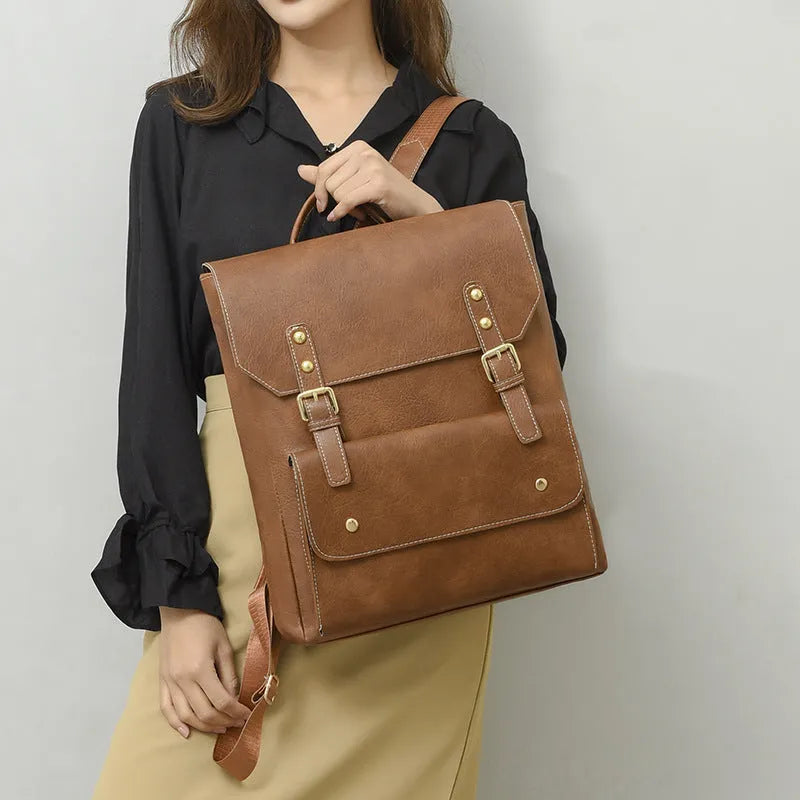 Soft brown retro Korean style PU backpack showing front view and ventilation detail.