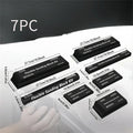 Seven black metal frosted blocks for model texturing arranged together
