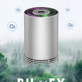Compact black car and desktop air purifier with aluminium alloy case on a wooden desk.