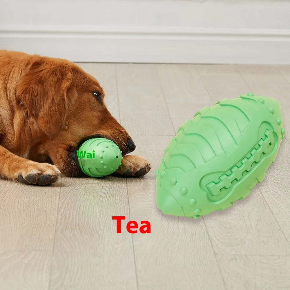 Thickened rubber rugby ball dog toy with squeaker in light green or sapphire blue colour