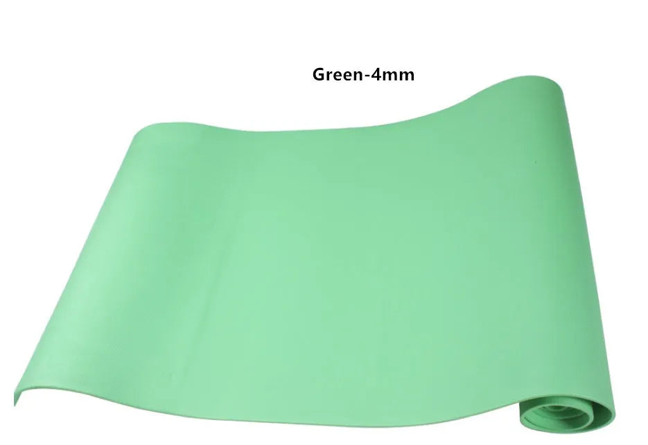 Red EVA fitness composite yoga mat with rolled edge showing 4mm thickness on a wooden floor.