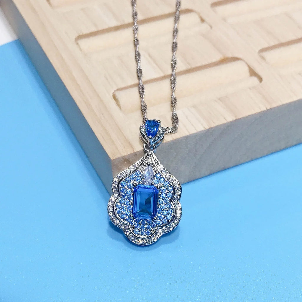 Sea blue geometric copper pendant with aquamarine topaz mirror finish