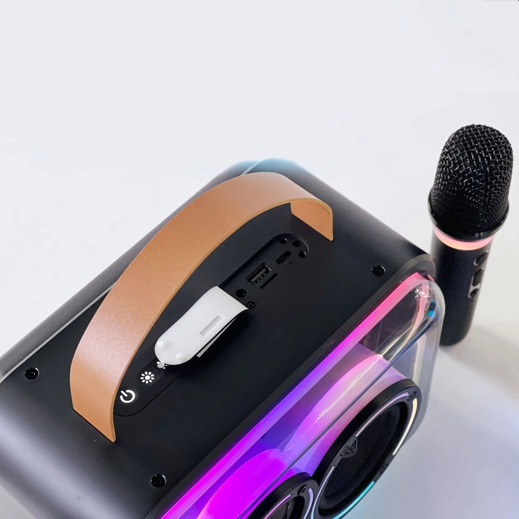 Light yellow portable Bluetooth karaoke speaker with colourful RGB lighting and microphone.