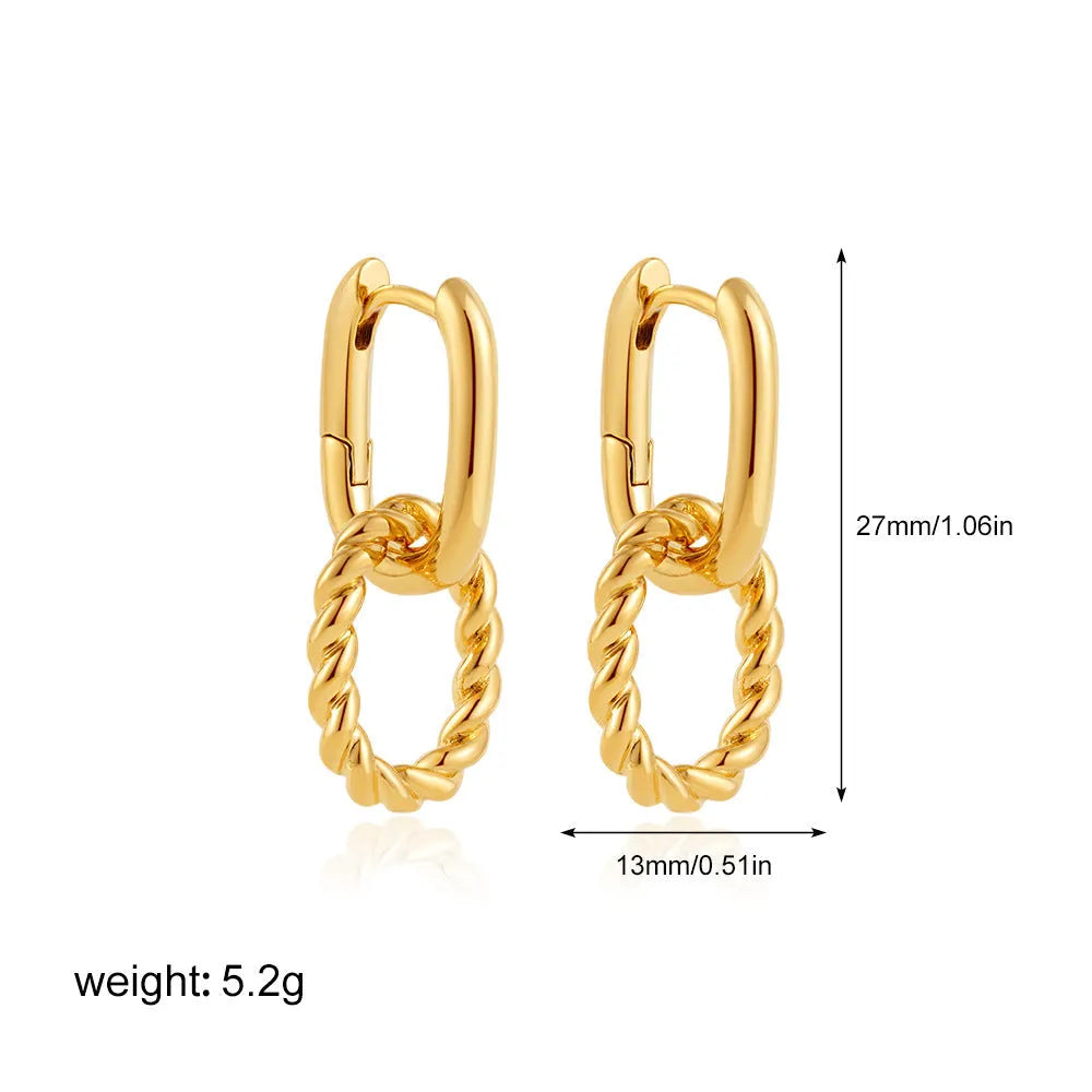 Copper geometric square double ring twist ear clip earrings on display