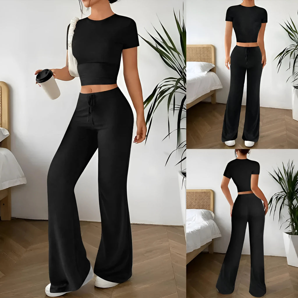 Black high-waisted trousers and short sleeve T-shirt co-ordinated suit for women.