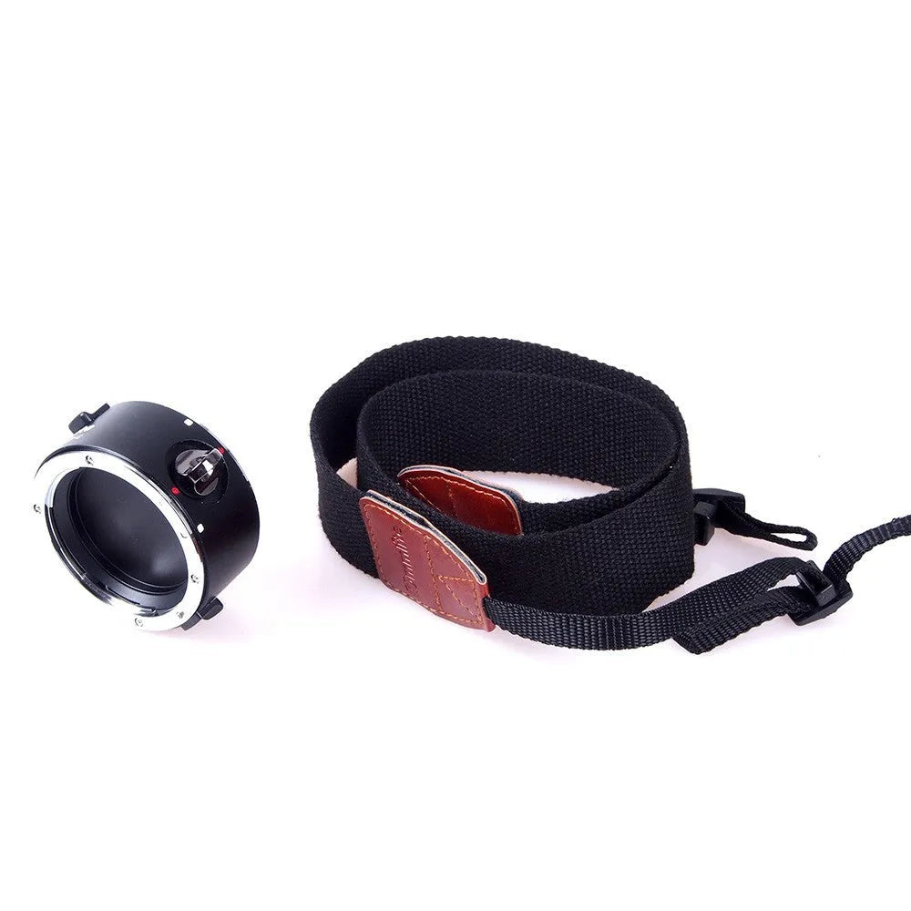 Aluminum alloy dual camera lens flipper holder with cotton strap for Canon, Nikon, and Sony cameras.