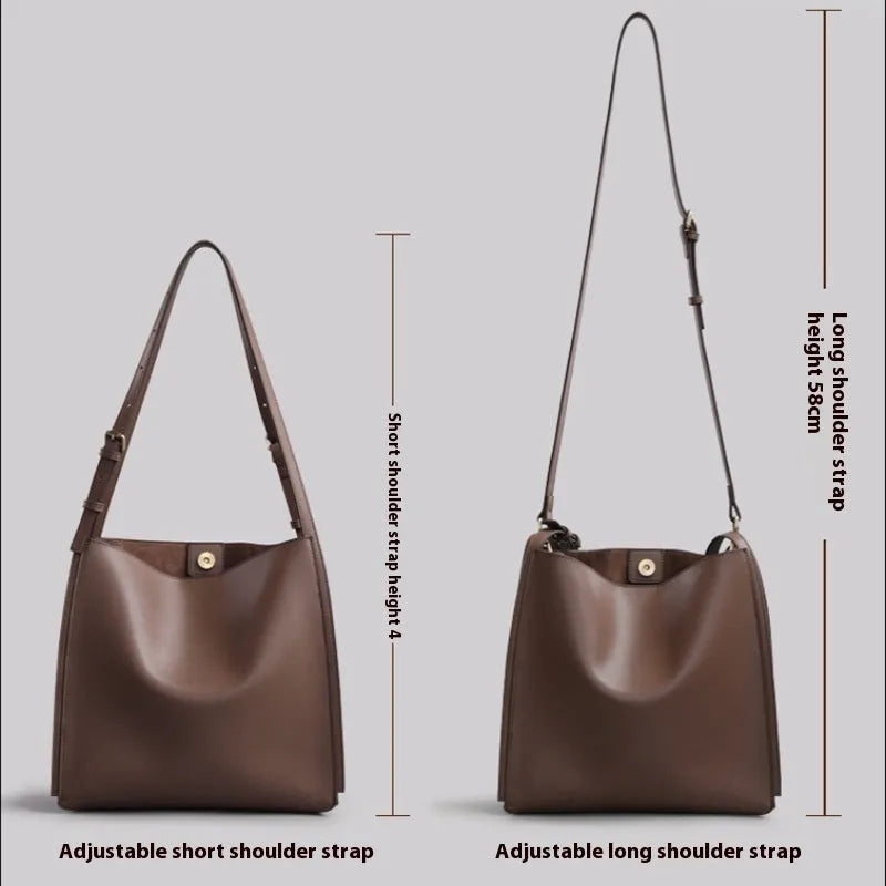 Genuine leather large capacity bucket shape women's handbag in brown with double shoulder straps and slit pocket