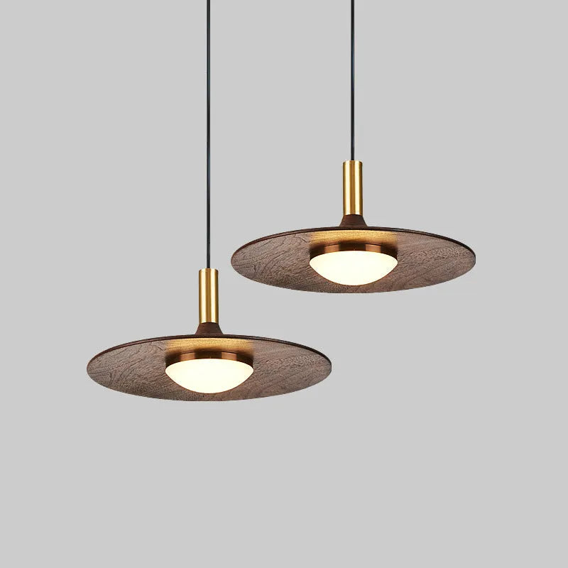 Wood and copper bar-style chandelier light fixture with push-button switch.