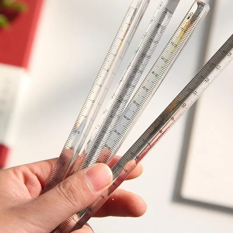 White plastic ruler 15cm on white background for primary school measuring
